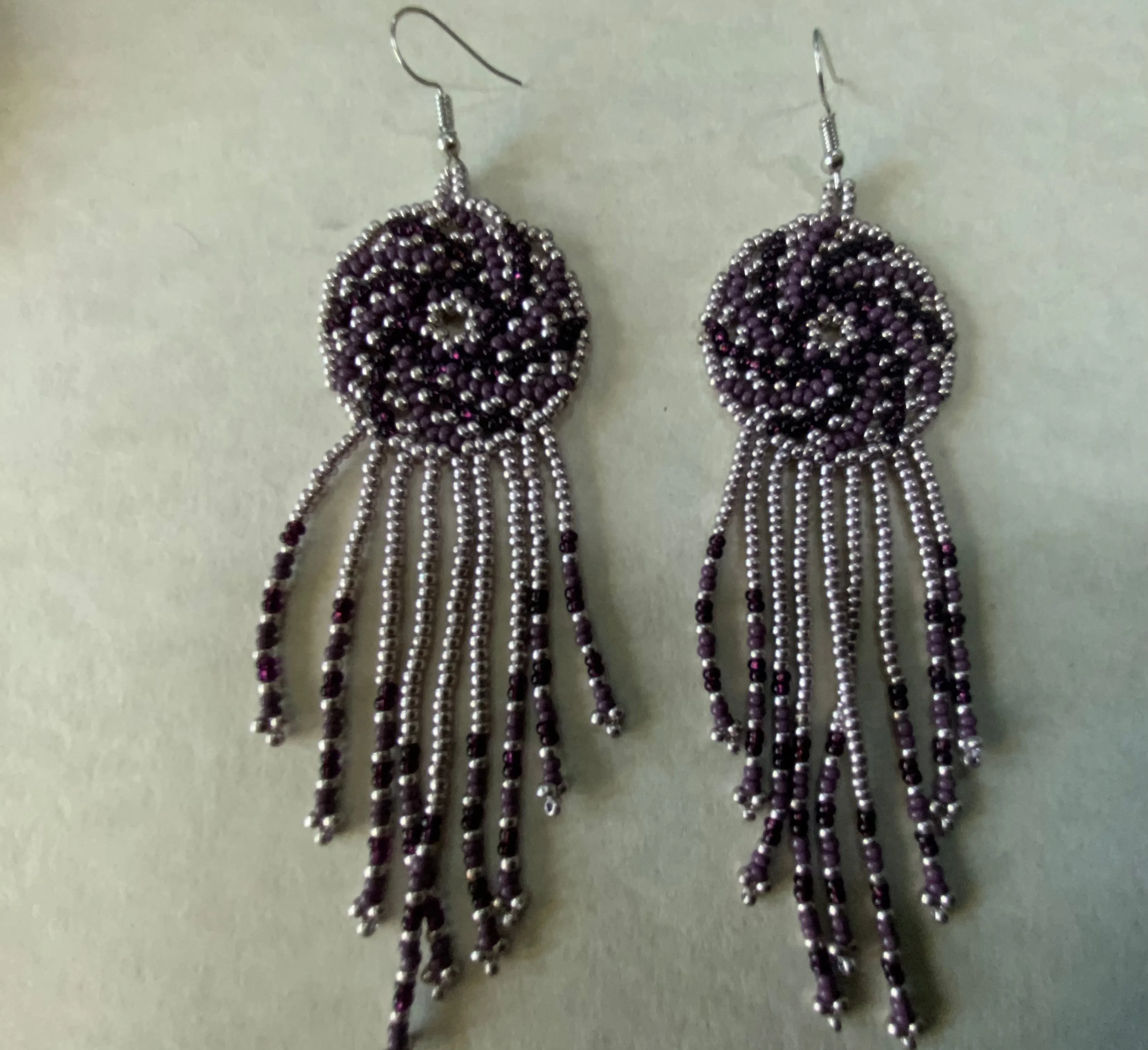 Guatemalan handcrafted glass seed bead earrings in Dream Catcher motif